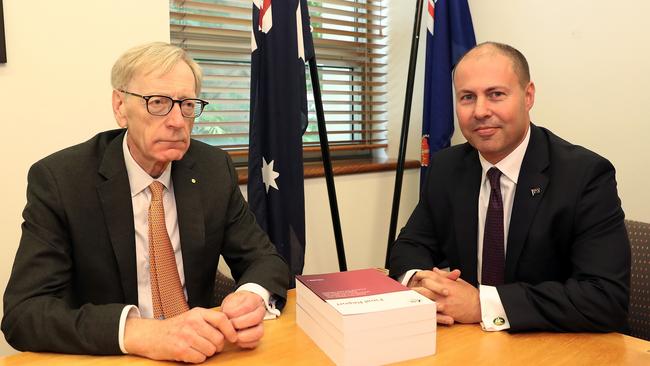 POOL PHOTOS FOR FAIRFAX AND AAP - PLEASE EMAIL ON -Commissioner Kenneth Hayne and Treasurer Josh Frydenberg with the final report from the Royal Commission into Misconduct in the Banking, Superannuation and Financial Services Industry, at Parliament House in Canberra. Picture Kym Smith