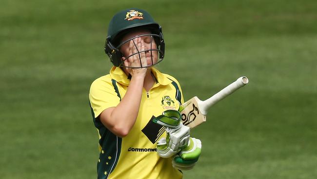 Alyssa Healy of Australia leaves the field after getting out to Suzie Bates of New Zealand during the Women's Twenty20 International match between the Australia Southern Stars and the New Zealand White Ferns at Adelaide Oval.