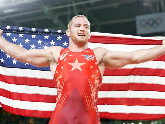 USA's Kyle Frederick Snyder celebrates after winning against Azerbaijan's Khetag Goziumov in their men's 97kg freestyle final match on August 21, 2016, during the wrestling event of the Rio 2016 Olympic Games at the Carioca Arena 2 in Rio de Janeiro. / AFP PHOTO / Jack GUEZ