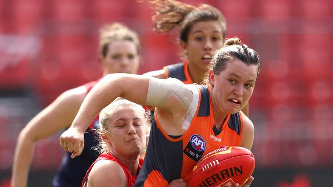 Alyce Parker under pressure during the AFLW semi final between the GWS Giants and Melbourne Demons.