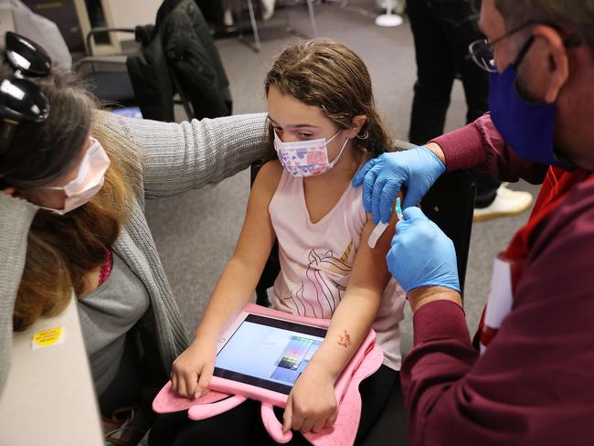 A child receives the Pfizer vaccination at the Fairfax County Government Centre in Annandale, Virginia. Picture: AFP