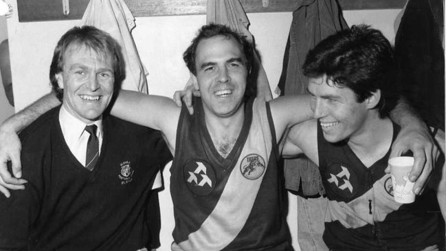 Footballer Peter Carey (c) with Graham Cornes and Stephen Kernahan after Peter's 350th match 1985.