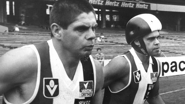 1984. St Kilda's Robert Muir, Phil Narkle (in helmet) and ?. Robbie Muir.