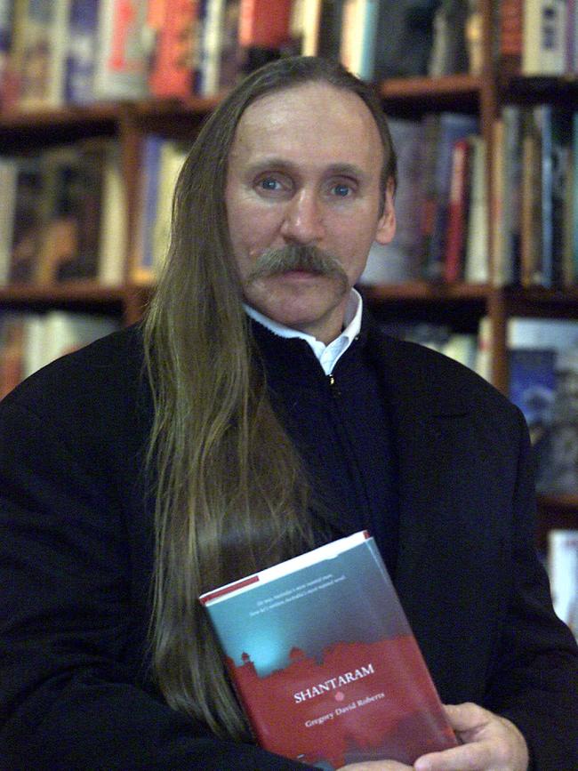 Gregory David Roberts with his best-selling book Shantaram.