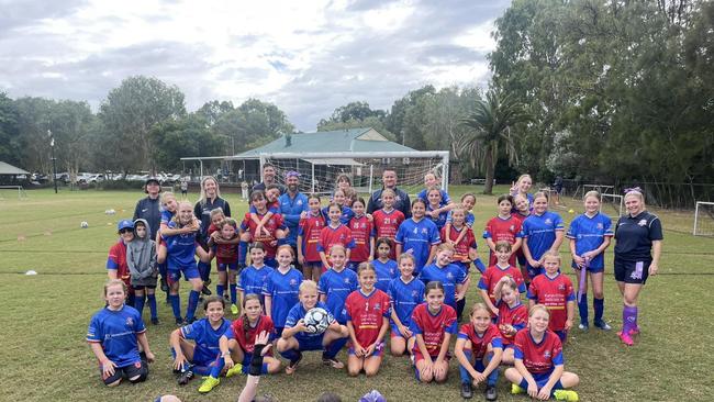 Robina City's junior and senior players trained together to celebrate Female Football Week.