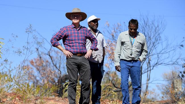 Prime Minister Malcolm Turnbull visits the Battery Hill mining museum with tradition owner Ronald Plummer (right), at Tennant Creek. Picture: AAP/Dan Himbrechts