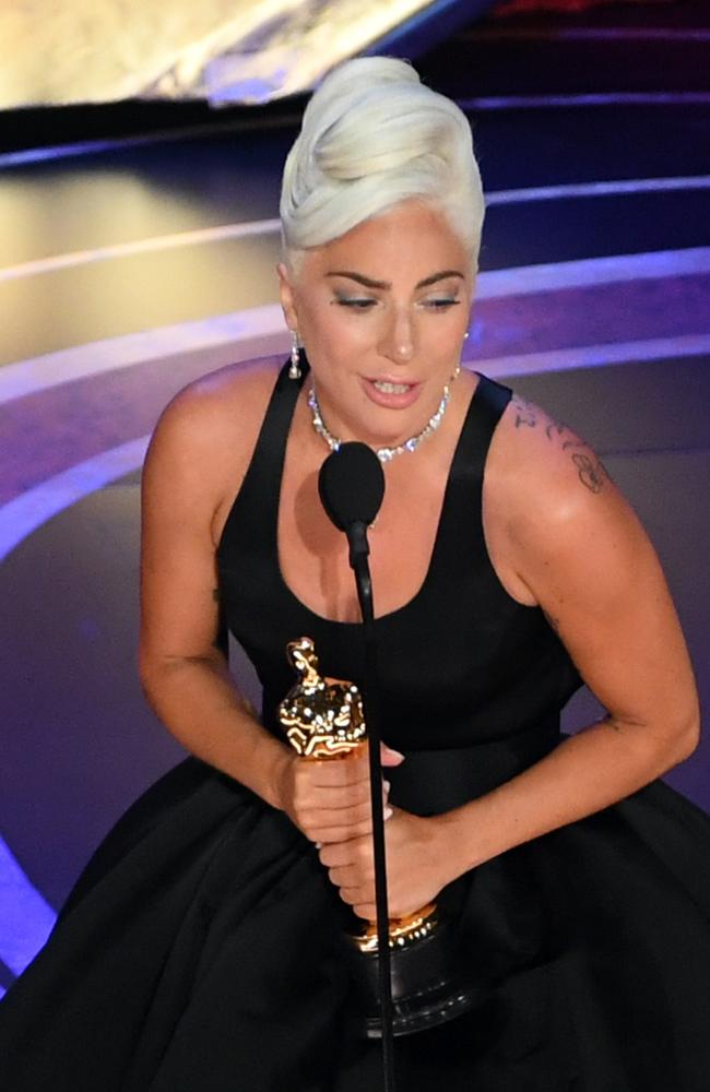 Lady Gaga with her Oscar for Best Original Song. Picture: Getty Images