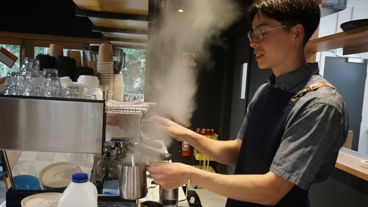 Barista Marcus Harrison at the The Darcy Street Project Epping Community Cafe. Photo: Supplied.