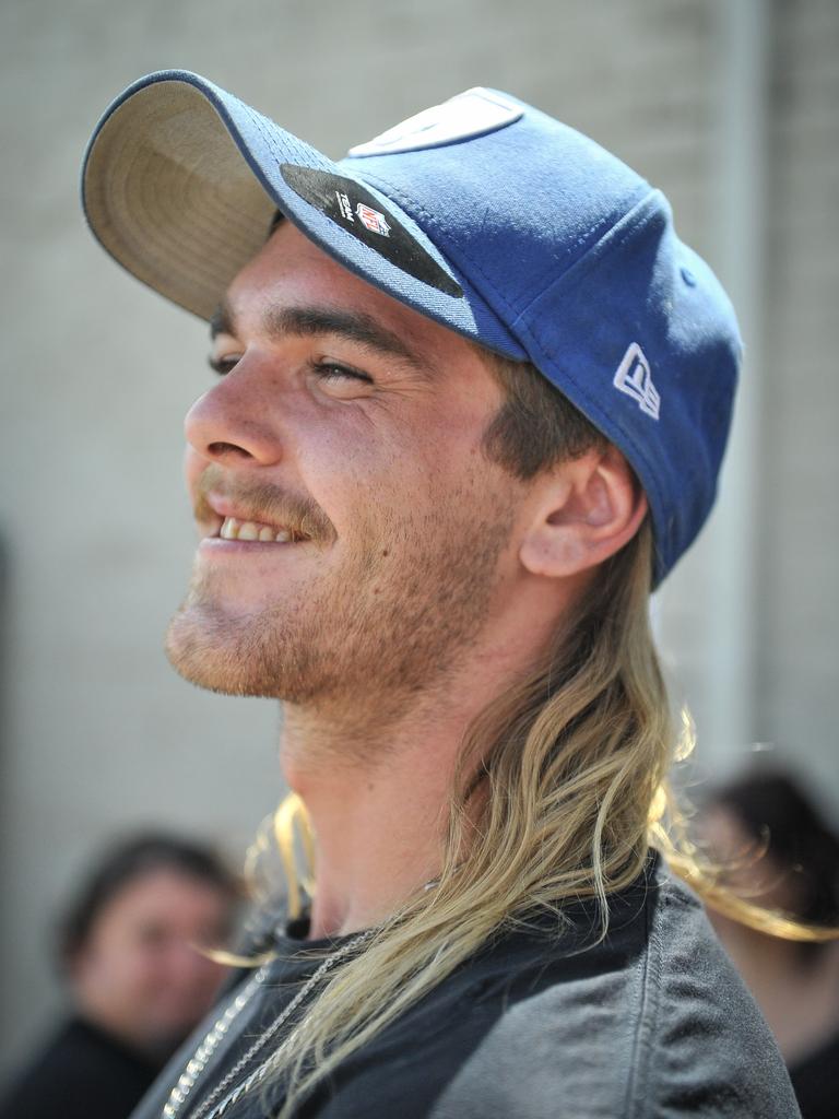 Participant Hayden Neale is seen during Mulletfest, a special event designed to celebrate the hairstyle that's all about business at the front, party at the back, Chelmsford Hotel, Kurri Kurri. (AAP Image/Perry Duffin) 