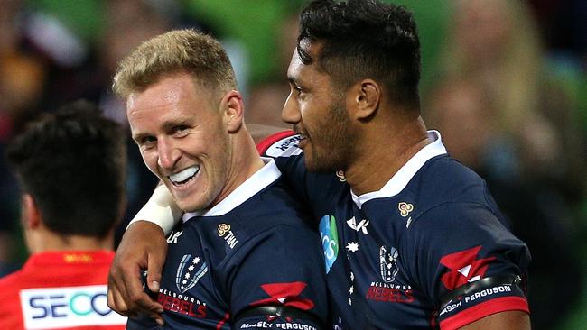 Reece Hodge and Robert Leota celebrate a try. Picture: AAP Images 