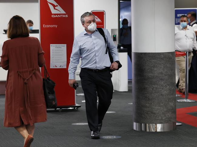 Passengers arrive from Sydney in the Qantas Terminal at Melbourne Airport on Monday as borders around Australia begin to open up again during COVID-19. Picture: Ian Currie