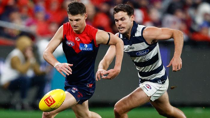 GEELONG, AUSTRALIA - JUNE 22: Judd McVee of the Demons and Jack Bowes of the Cats in action during the 2023 AFL Round 15 match between the Geelong Cats and the Melbourne Demons at GMHBA Stadium on June 22, 2023 in Geelong, Australia. (Photo by Michael Willson/AFL Photos)