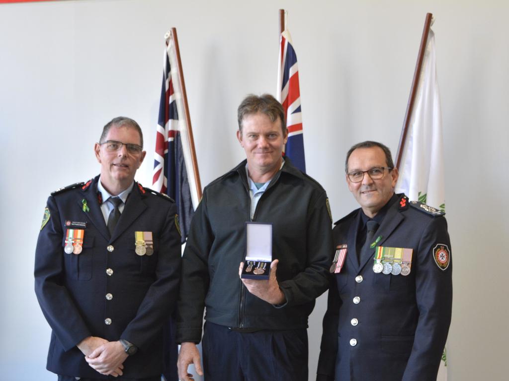 Severnlea West Rural Fire Brigade first officer Stephen Oliver was awarded a QFEs medal for his prolonged diligent and ethical service during Rural Fire Service Week on Saturday, August 3rd. Photo: Jessica Klein