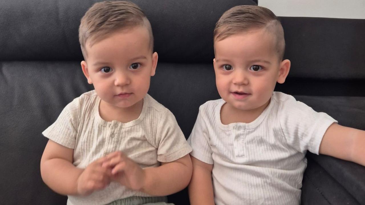 Rufio West (right), who was born with a congenital birth defect, with his identical twin brother Alfie West (left). Picture: Supplied