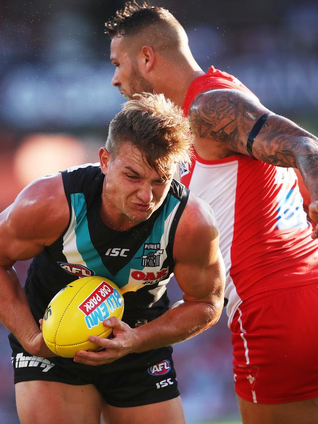 Port Adelaide's Ollie Wines and Sydney's Lance Franklin at the SCG. Picture. Phil Hillyard