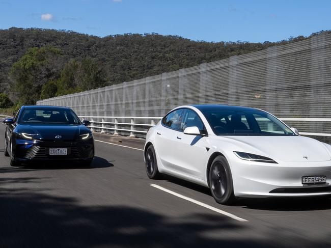 Tesla Model 3 and Toyota Camry Hybrid. Photo: Camber Collective