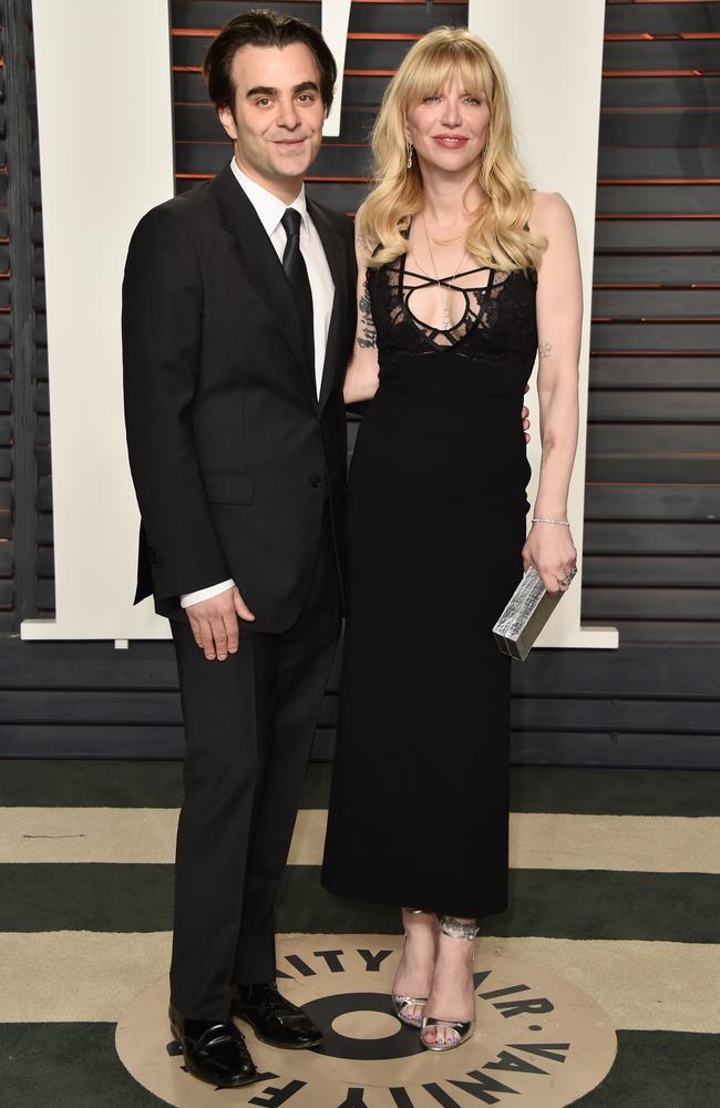 Director Nicholas Jarecki (L) and recording artist Courtney Love attend the 2016 Vanity Fair Oscar Party. (Photo by Pascal Le Segretain/Getty Images)