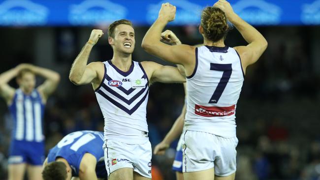 Hayden Crozier and Nat Fyfe celebrate after the final siren. Picture: AAP Images