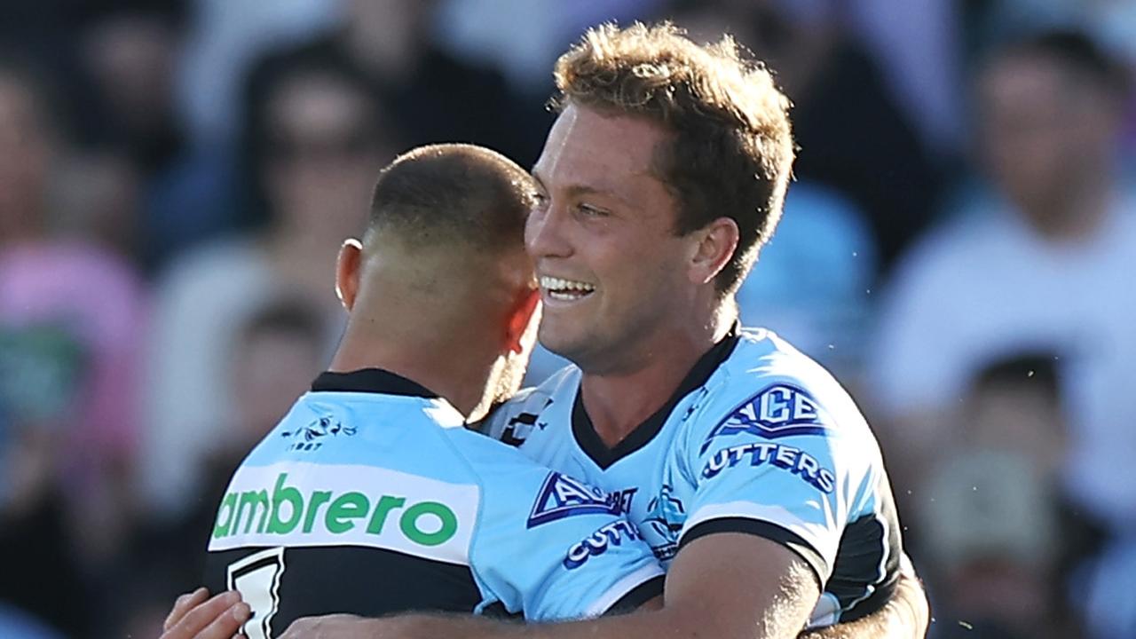 COFFS HARBOUR, AUSTRALIA - JUNE 18: Matt Moylan of the Sharks celebrates with sWilliam Kennedysof the Sharks after scoring a try during the round 15 NRL match between the Cronulla Sharks and the Gold Coast Titans at , on June 18, 2022, in Coffs Harbour, Australia. (Photo by Mark Kolbe/Getty Images)
