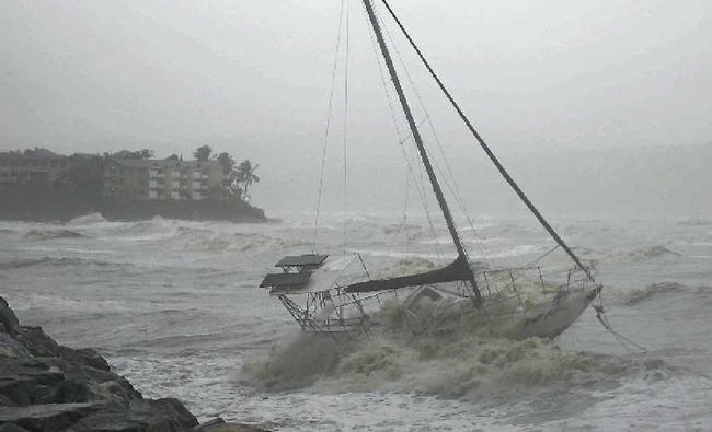 CASUALTY: Shortly after this photo was taken, this boat hit the rocks at the Whitsunday Sailing Club. Photo by David Cranson.