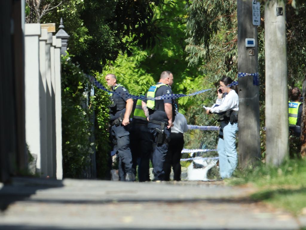 Parents outside the school after the incident. Picture: David Caird