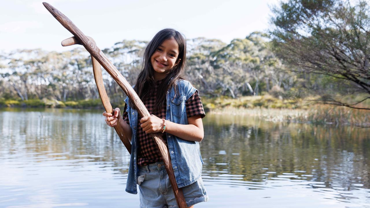 Joowal Williams, 9, learns about her Aboriginal heritage from elders including Uncle Col and Uncle Peter. Picture: David Swift