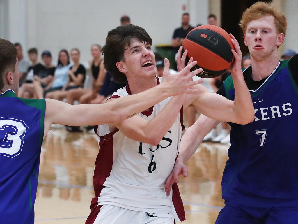 Basketball Australia Schools Championships at Carrara. Mens open final, Lake Ginninderra College Lakers V TSS (in white). the Lakers defence gave Benjamin Tweedy from TSS special attention in the final. Picture Glenn Hampson