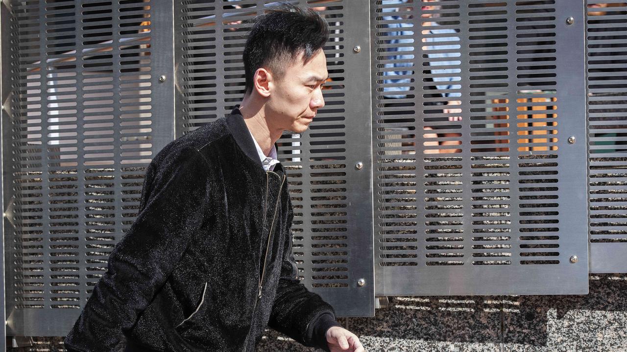 Quingxiang Meng arrives the Hobart Magistrates Court.