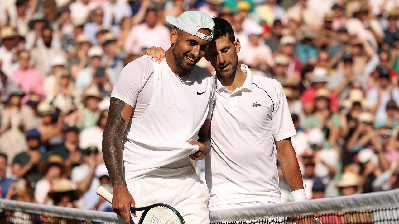 LONDON, ENGLAND - JULY 10: Winner Novak Djokovic of Serbia (L) and runner up Nick Kyrgios of Australia interact by the net following their Men's Singles Final match day fourteen of The Championships Wimbledon 2022 at All England Lawn Tennis and Croquet Club on July 10, 2022 in London, England. (Photo by Ryan Pierse/Getty Images)