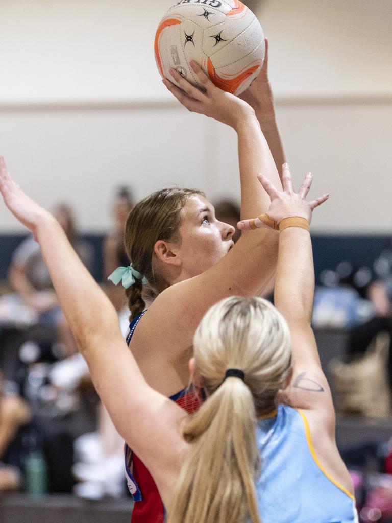 Amy Williams shoots for Darling Downs against Peninsula in Queensland School Sport 16-19 Years Girls Netball Championships at Clive Berghofer Arena, St Mary's College, Friday, May 6, 2022. Picture: Kevin Farmer