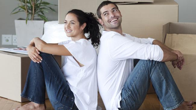 Happy Young Couple Moving House