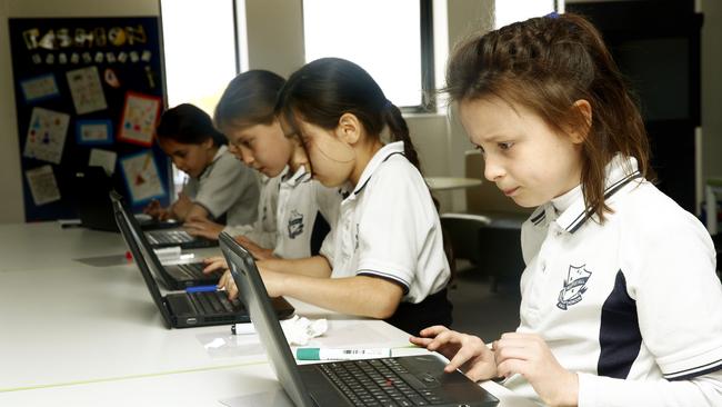 Students at work in the new open plan classrooms.