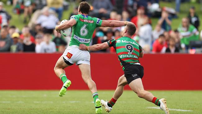 Raiders’ five-eighth Jack Wighton is tackled by Damien Cook of the Rabbitohs during the round 11 NRL match between the South Sydney Rabbitohs and the Canberra Raiders at APEX Oval. (Picture: Mark Kolbe/Getty Images)