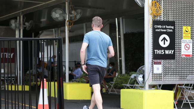 A top national epidemiologist warned Queenslanders that spread of Covid-19 can only be stopped with mandates. A man enters the Cairns Hospital Covid-19 testing facility. Picture: Brendan Radke