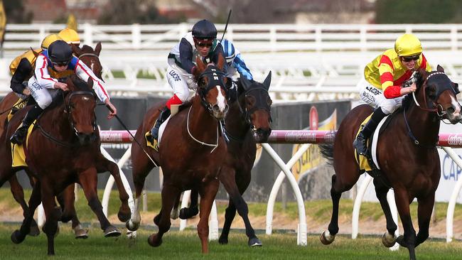 Jockey Ben Allen rides Snitzepeg to win race 8, Barbara Hardeman Vobis Gold Reef  during Bletchingly Stakes Day at Caulfield Racecourse in Melbourne, Saturday, July 28, 2018. (AAP Image/George Salpigtidis) NO ARCHIVING, EDITORIAL USE ONLY