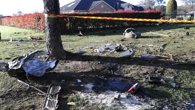 The crash site on East Parade at Buxton, strewn with wreckage. Picture: John Grainger