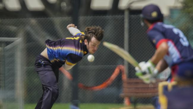 Ringwood quickie Zak Evans goes after Dandenong skipper Tom Donnell.