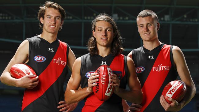 Essendon’s newest draft crop: Zach Reid, Archie Perkins and Nik Cox. All will be pushing for senior selection this year. Picture: Dylan Burns/AFL Photos via Getty Images