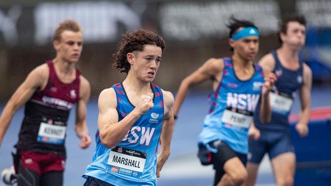 Max Marshall from Shoalhaven Heads and Xavier Perry to his right in the 200m