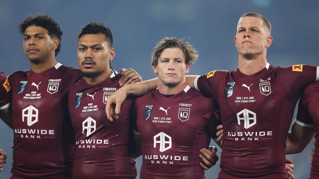 SYDNEY, AUSTRALIA – JUNE 08: (L-R) Selwyn Cobbo, Jeremiah Nanai, Harry Grant and Lindsay Collins of the Maroons line up for the national anthem before game one of the 2022 State of Origin series between the New South Wales Blues and the Queensland Maroons at Accor Stadium on June 08, 2022, in Sydney, Australia. (Photo by Mark Kolbe/Getty Images)