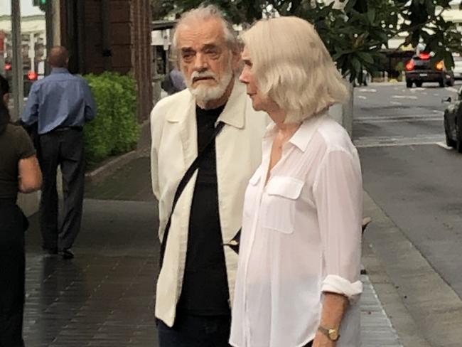 John Hamilton Doyle (left), 80, of Milsons Point, outside Manly Courthouse with a supporter on Wednesday where he appeared on four charges of possess child abuse material. Picture: Jim O'Rourke