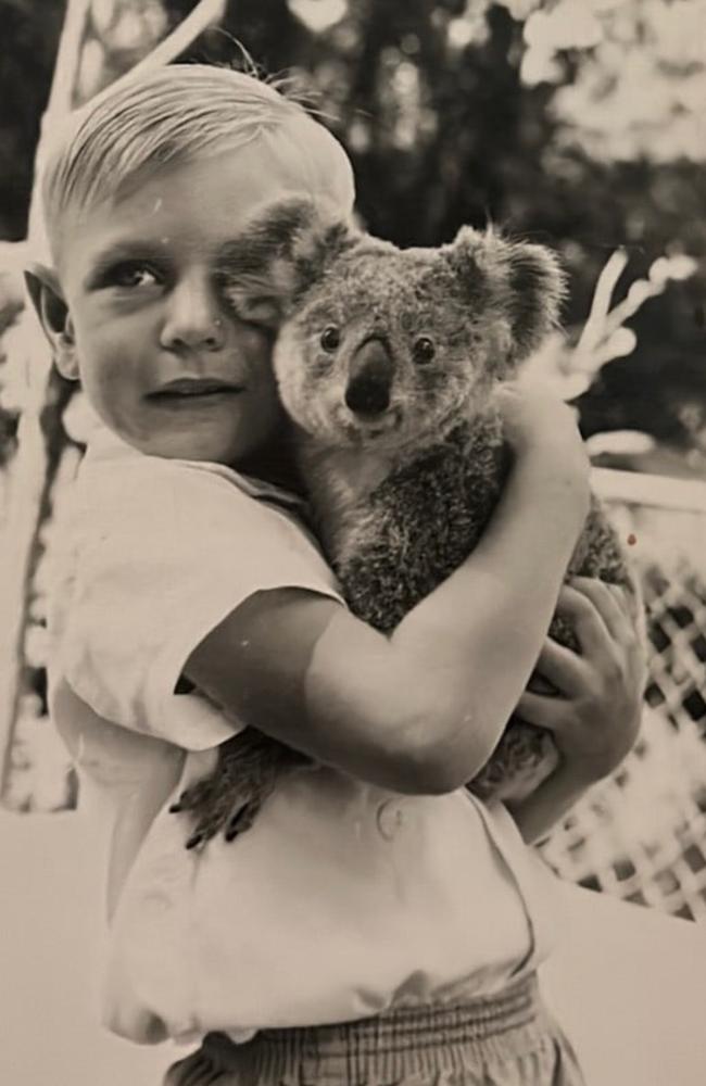 Rhonda George and Judith Murphy are searching for their long-lost brother Gary Williams who moved to Toowoomba when he was a young boy. He is pictured here, as a child, at Lone Pine Koala Sanctuary in Brisbane. Picture: Supplied