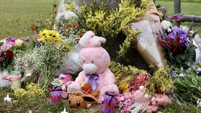 Flowers and toys at the memorial for Mia at Glindemann Park. Picture: Liam Kidston