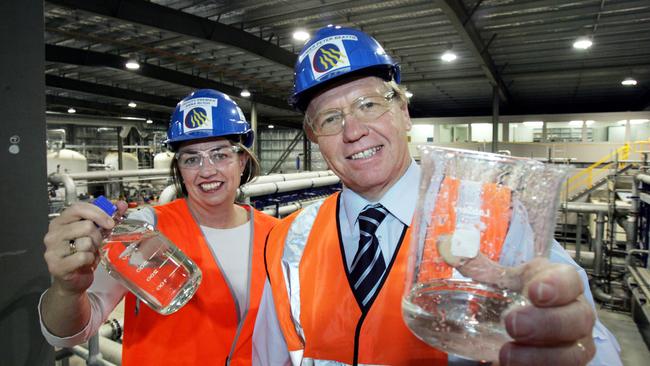 Then-premier Peter Beattie and then-deputy premier Anna Bligh with recycled water at the Advance Wastewater Treatment Plant at Bundamba.