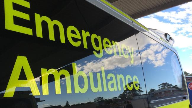 The two children assisted their father while waiting for an ambulance.