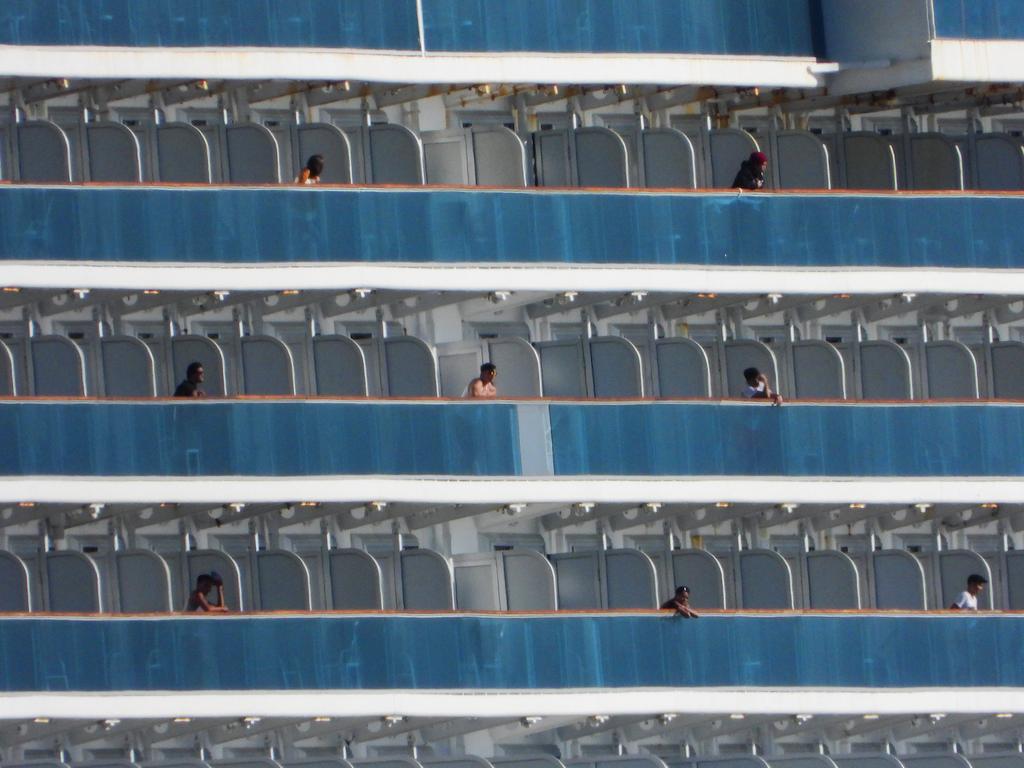 Crew who remain on the ship off Port Kembla. Picture: John Grainger