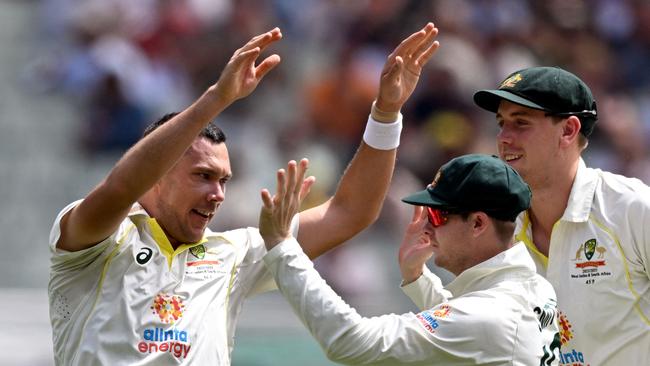 Scott Boland had the Melbourne crowd eating out of the palm of his hand once again. Picture: AFP