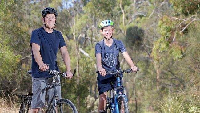 Allan Halyk and his son Tom, 12, will participate in this weekend's family bicycle treasure hunt at Huntingfield. Picture: PATRICK GEE