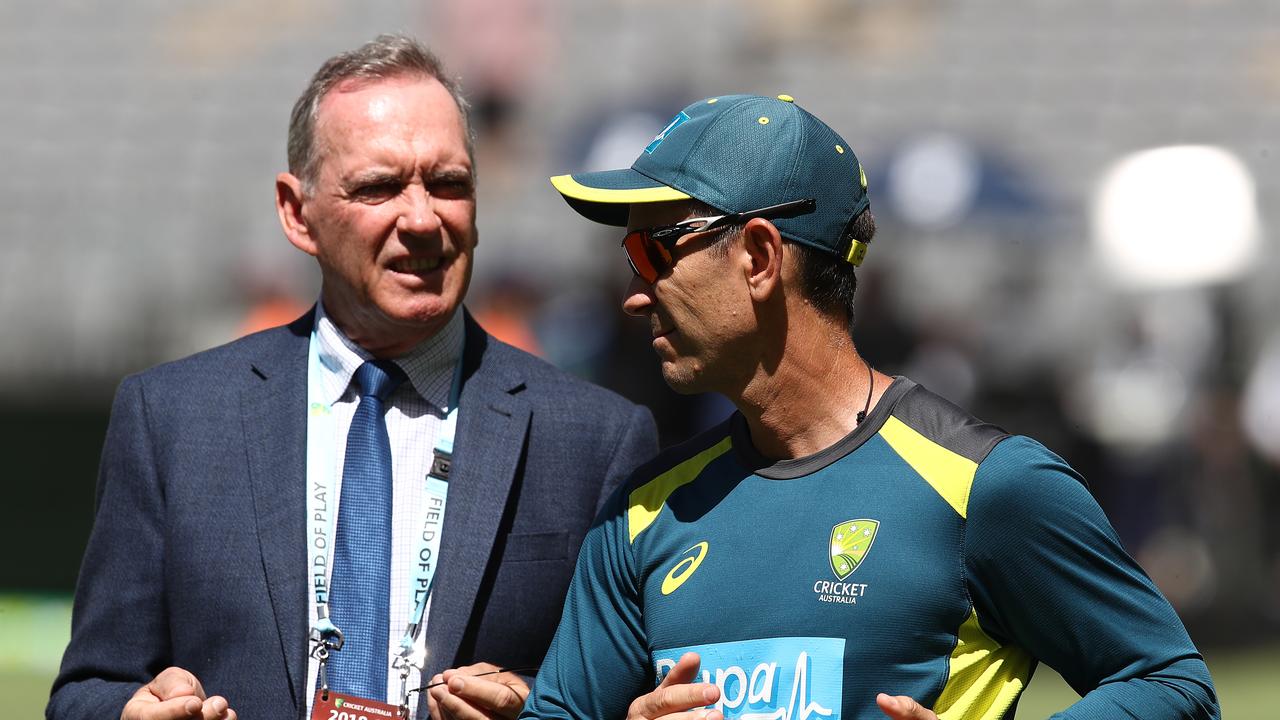 Outgoing Cricket NSW chief executive Andrew Jones believes Australia should change their selection model. Pictured: Coach Justin Langer and national selector Trevor Hohns. 