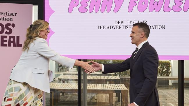 The Advertiser Foundation deputy chair Penny Fowler welcoming Premier Peter Malinauskas to the stage on Monday night. Picture: Matt Loxton